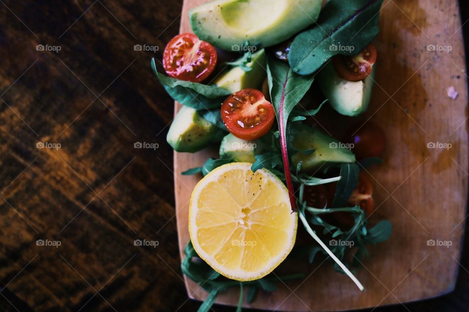 Salad on wooden table
