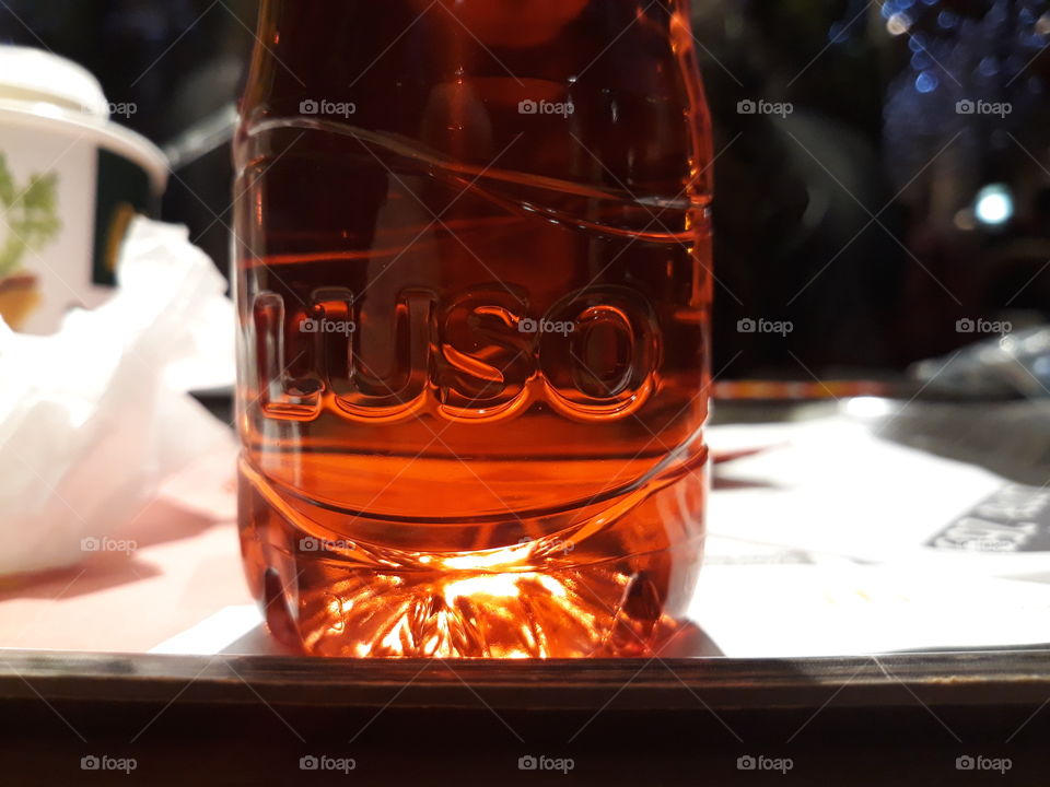 water Luso with red fruit