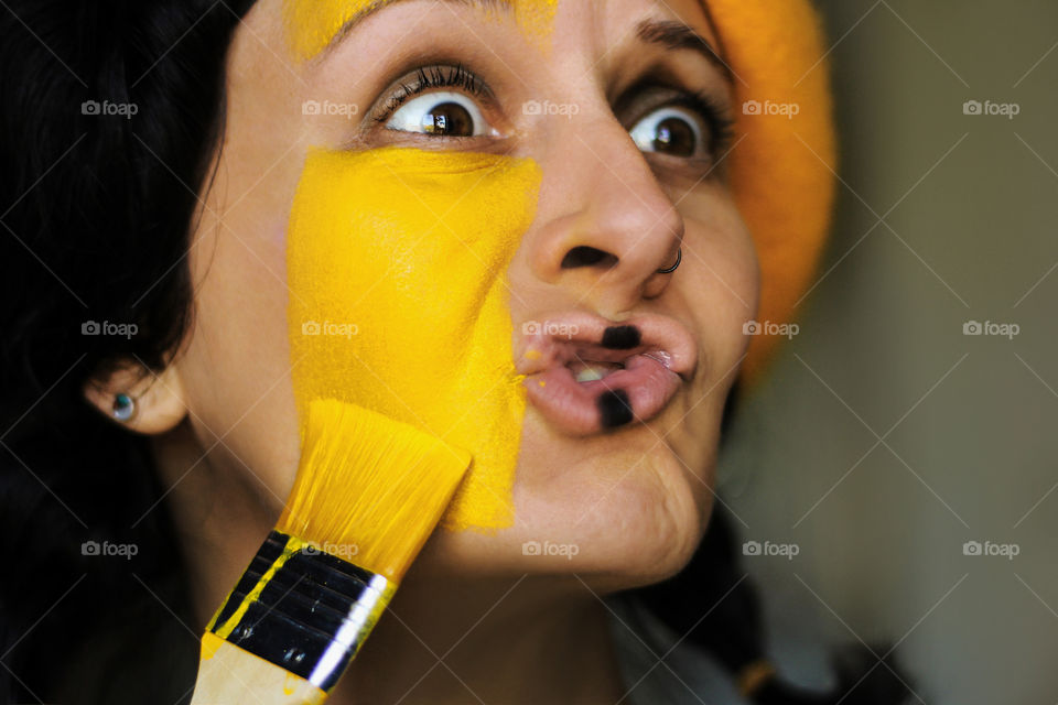 Painter portrait in yellow