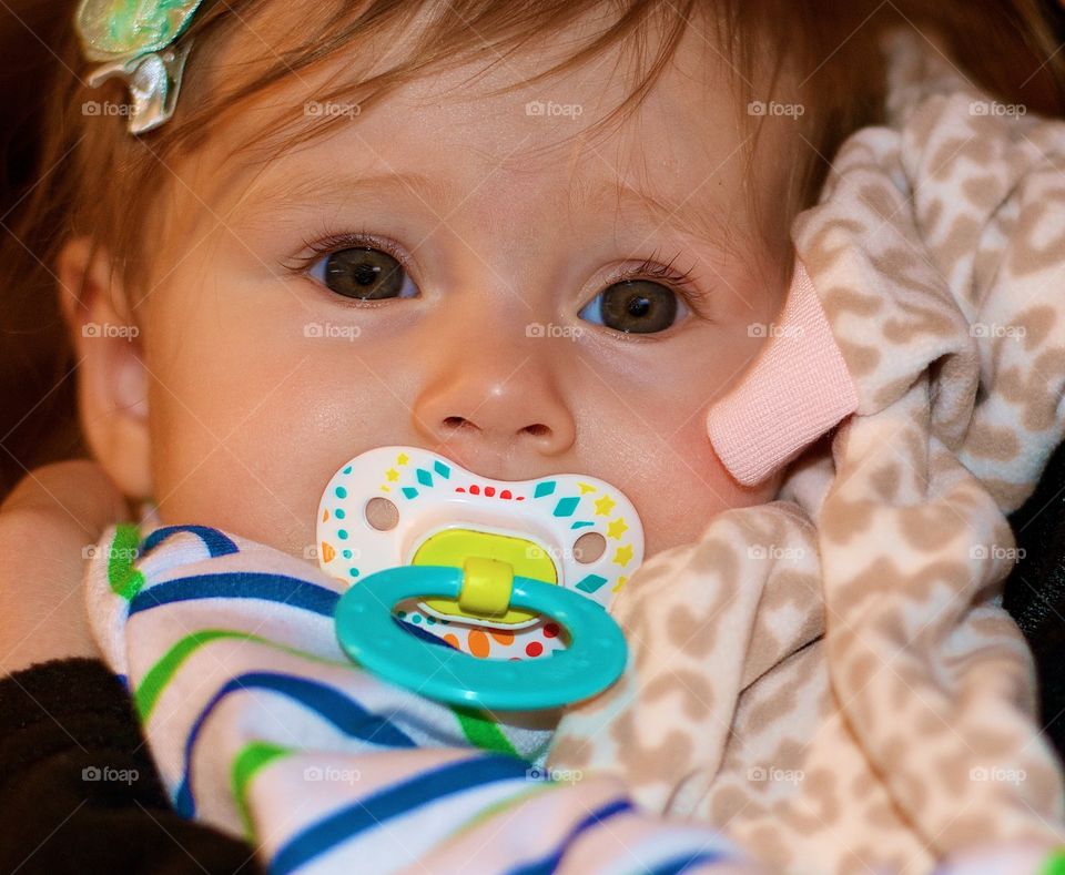 Baby with Binkey. Baby with her pacifier