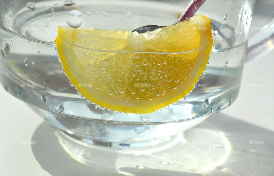 cup water with lemon