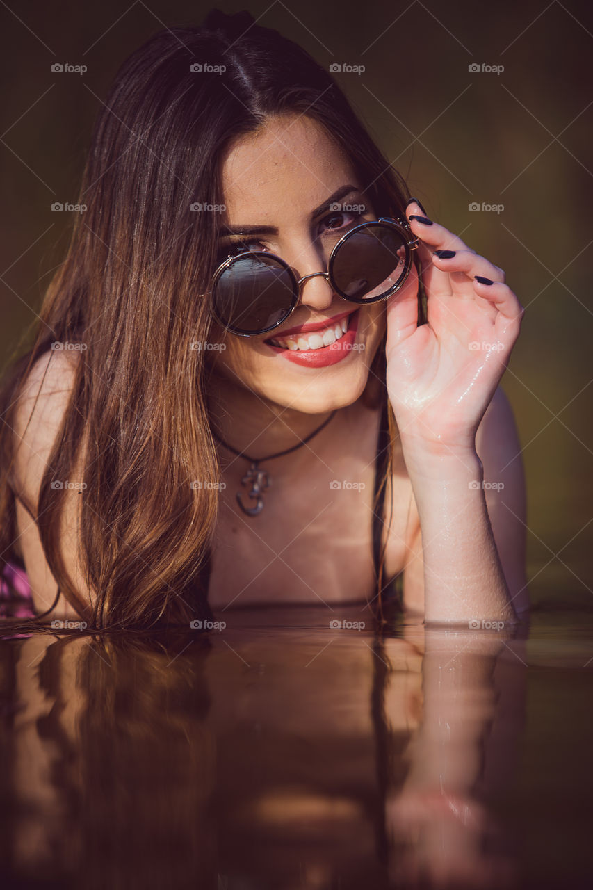 Close-up of beautiful woman in water