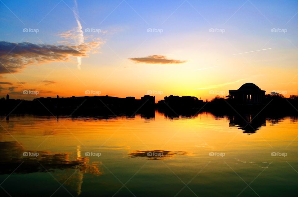 Golden Sunrise. Went to see the sunrise with Cherry Blossoms at the Jefferson Memorial in DC!