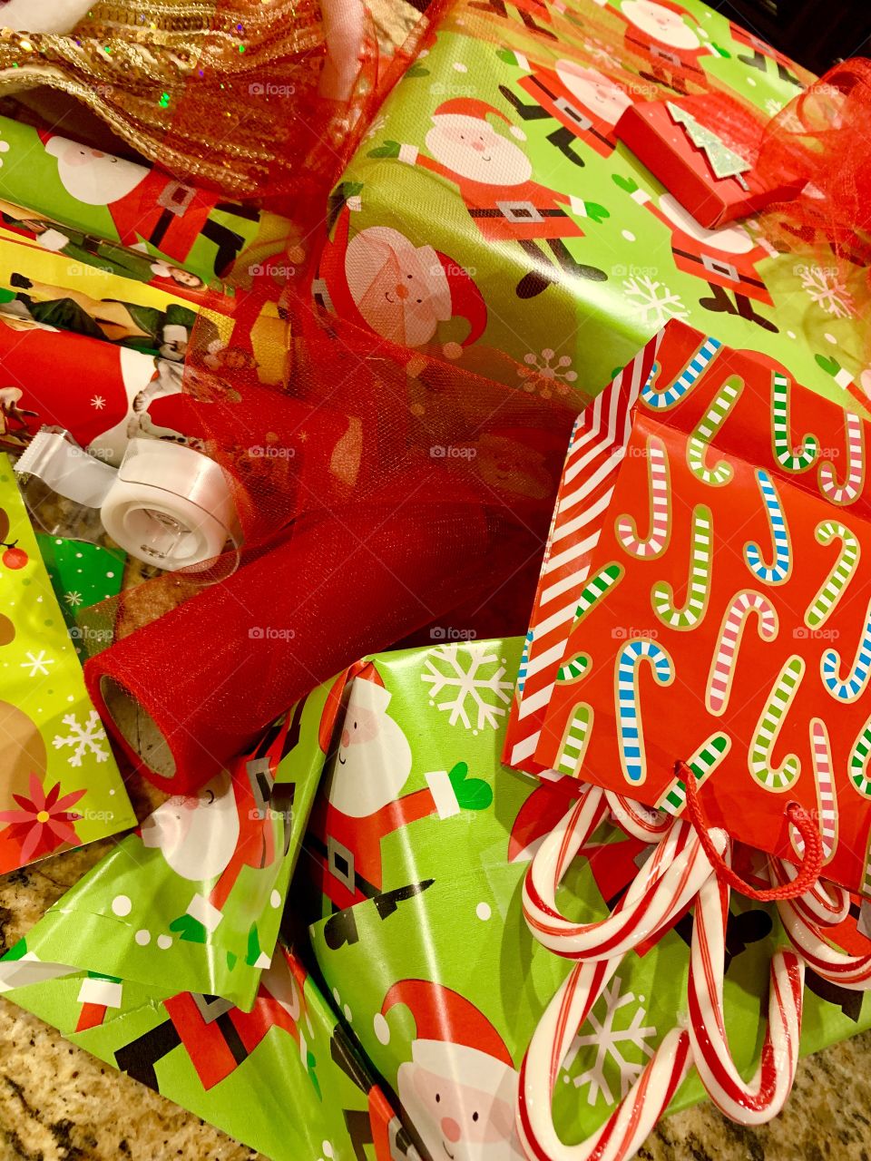 Christmas wrapping, candy canes and Christmas music getting ready for Santa!