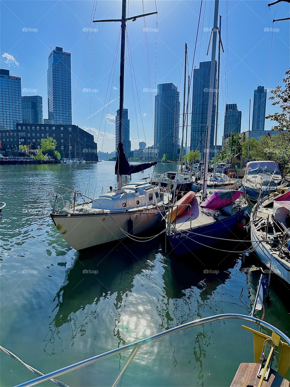 This is beautiful “Newtown Creek” by the “Pulaski Bridge” in LIC, Queens with its many boats seen from aboard “Salvation”, a “28 foot 1969 Luhrs” cabin cruiser that is home to myself and partner “Timothy Trespas”. 2024. Hypnotic Productions