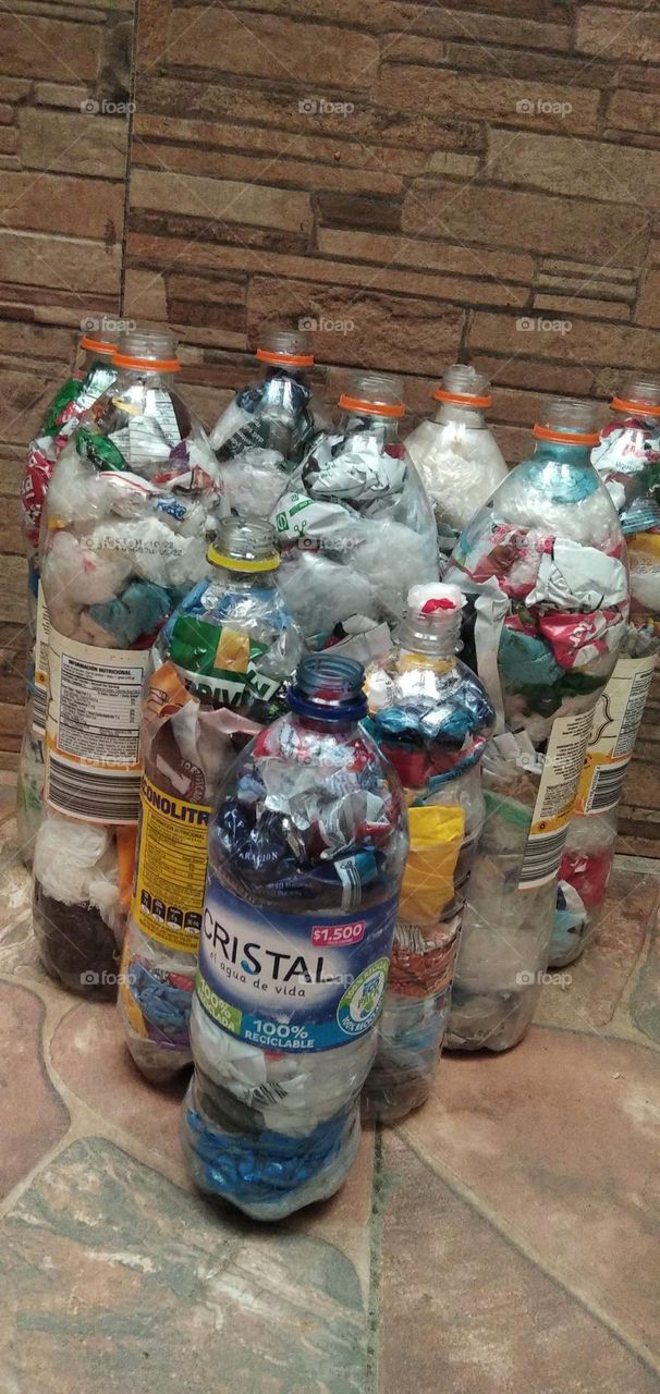 I don't throw away the plastic, I do this and give them to people in charge of recycling