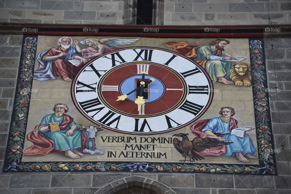 Colorful clock on the tower of Black Church, Brasov, Romania