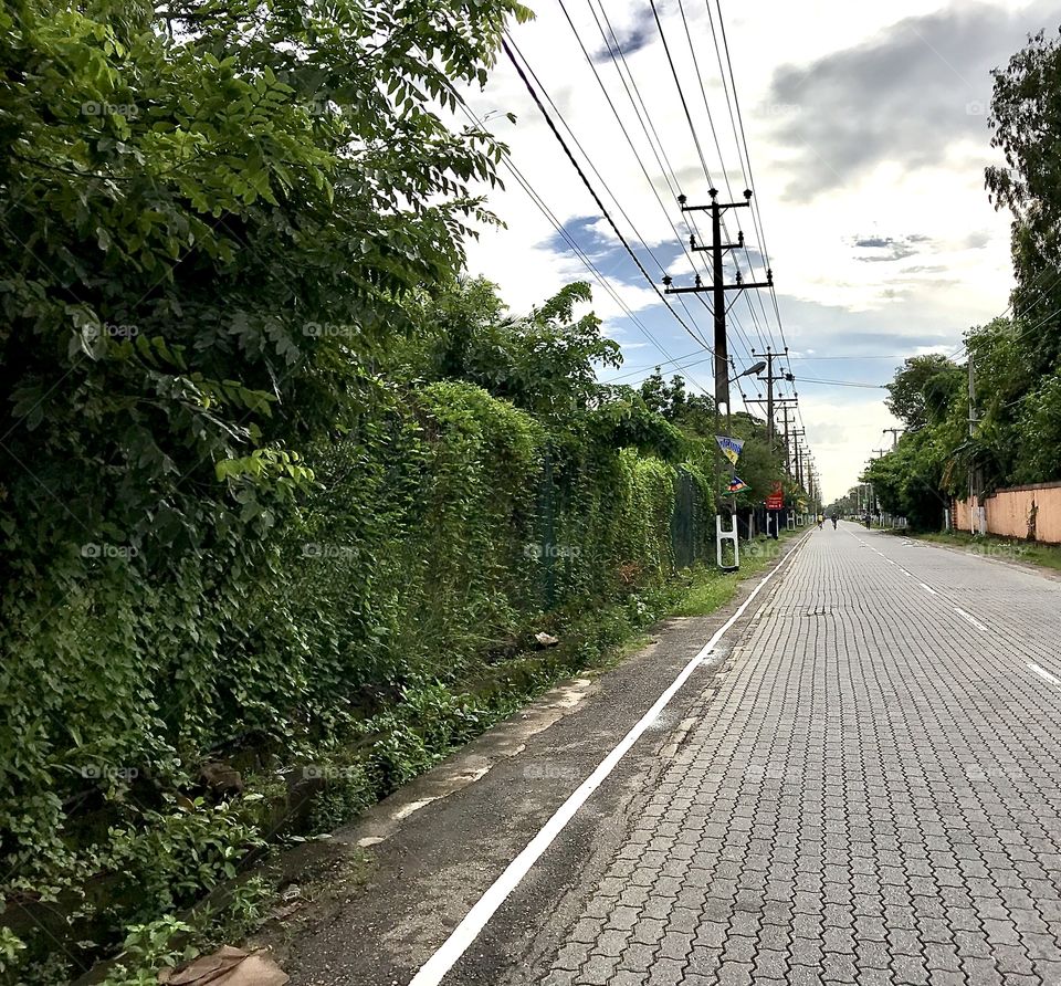 Long straight street in Moratuwa Sri Lanka