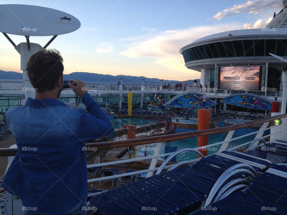 Take a picture on the boat. Royal caribben,marine e of the sea