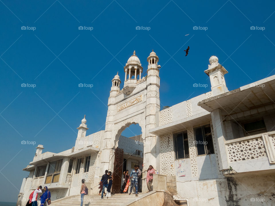 Photo Description:
Haji Ali Dargah is a mosque and dargah (tomb) located on an islet off the coast of Worli in the southern part of Mumbai. Near the heart of the city proper, the dargah is one of the most recognisable landmarks of Mumbai.