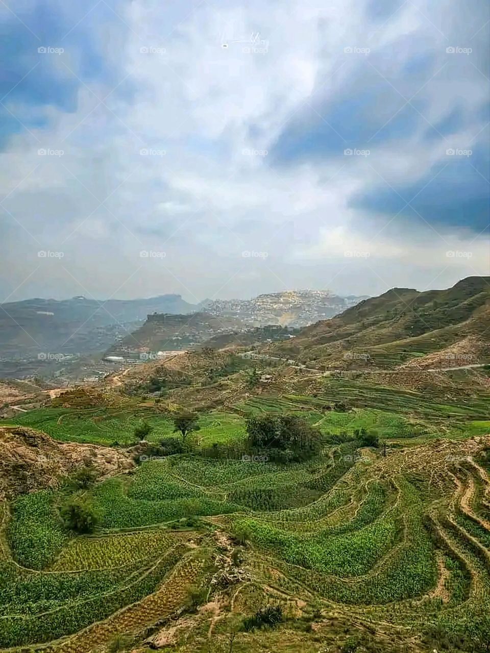 Glory be to God, the magnificent and picturesque view and the natural green trees are a view that is nothing more wonderful than it