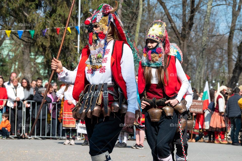 Kukeri are elaborately costumed Bulgarian man, who perform traditional rituals intended to scare away evil spirits. Until recently, all Kukeri were man, but now we can also see women 🙂
