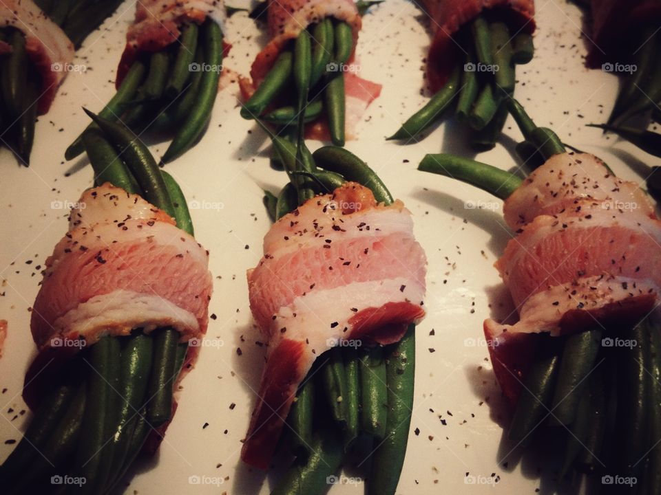 Bacon Wrapped Green Beans with Salt and Pepper Waiting to be Cooked