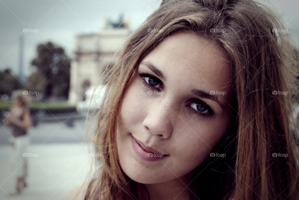 Young girl. Close up photo of a young girl visiting Paris
