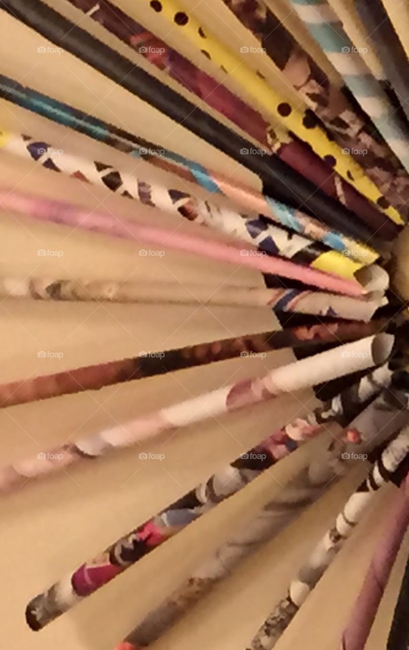 Design of Rolled up papers to look like states in half circle. Also colors.