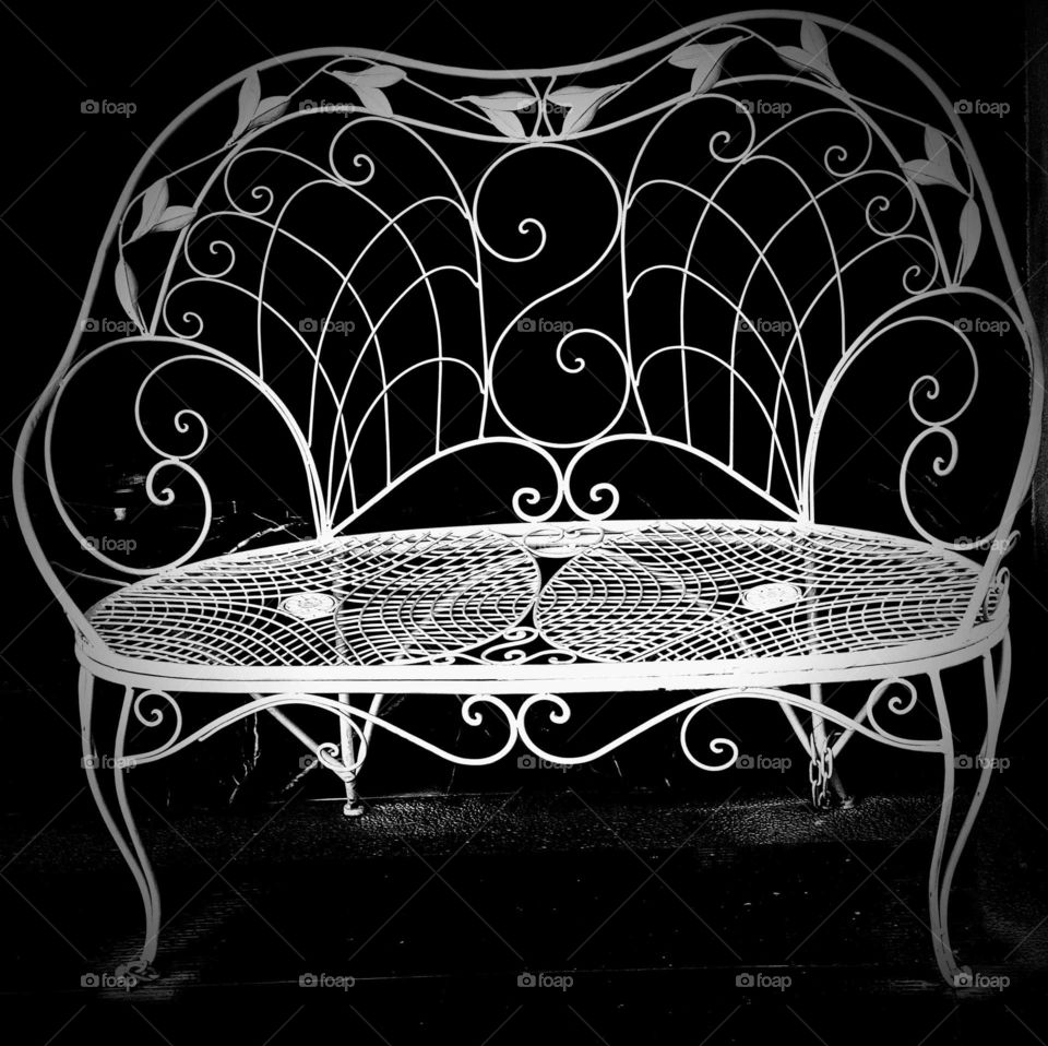 World in black and white: white chair. soft curve.