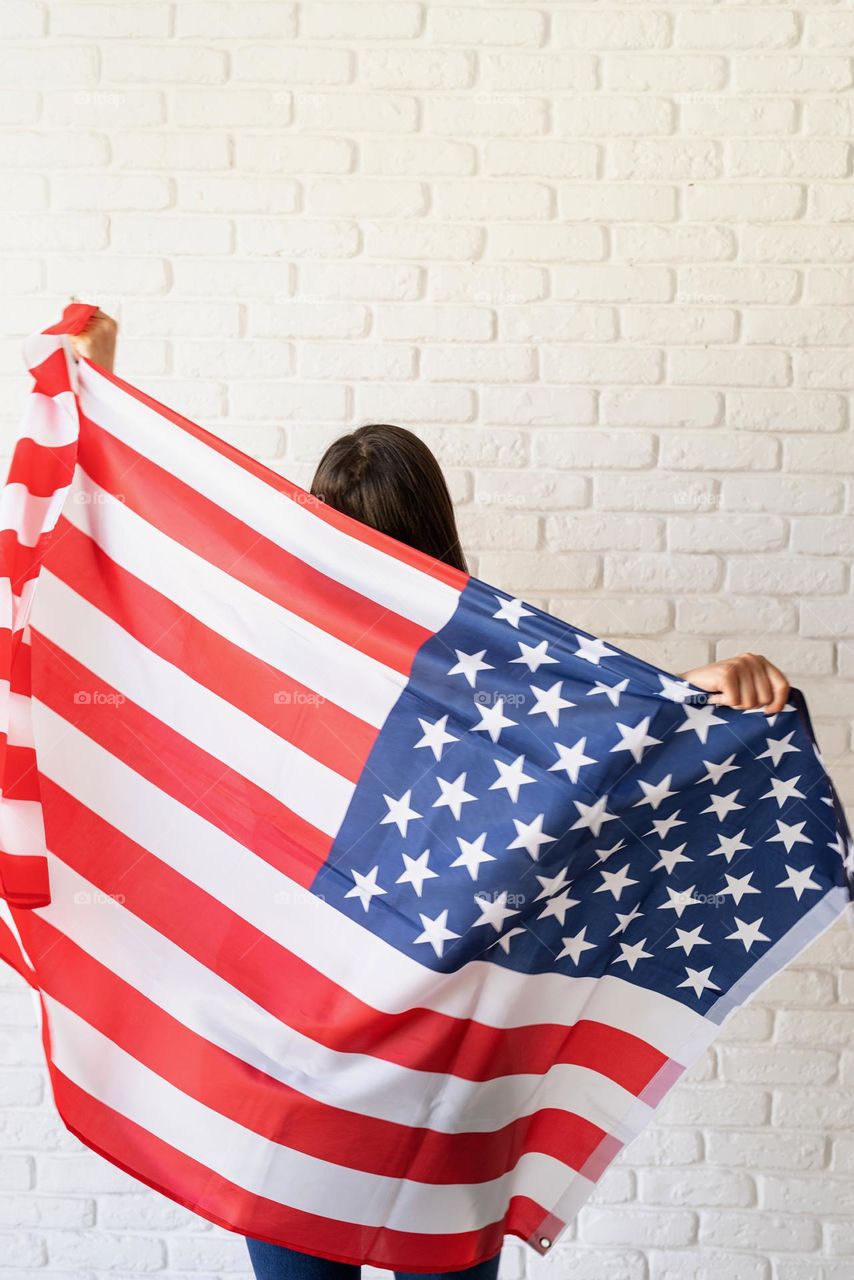 woman holding USA flag