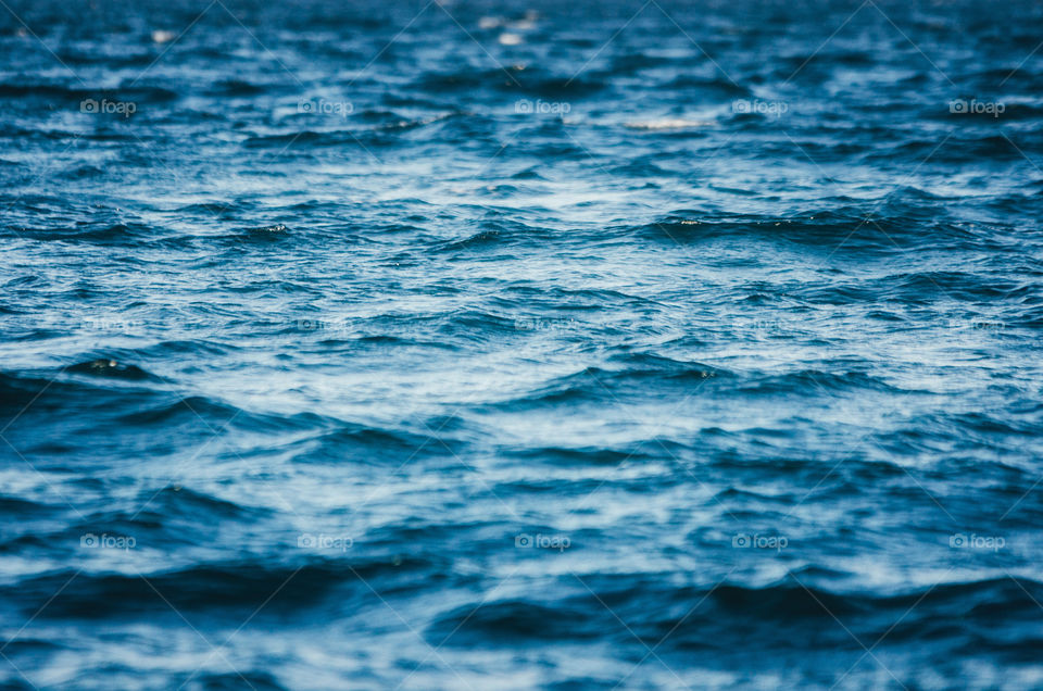 In a open sea. Waves in a dark water