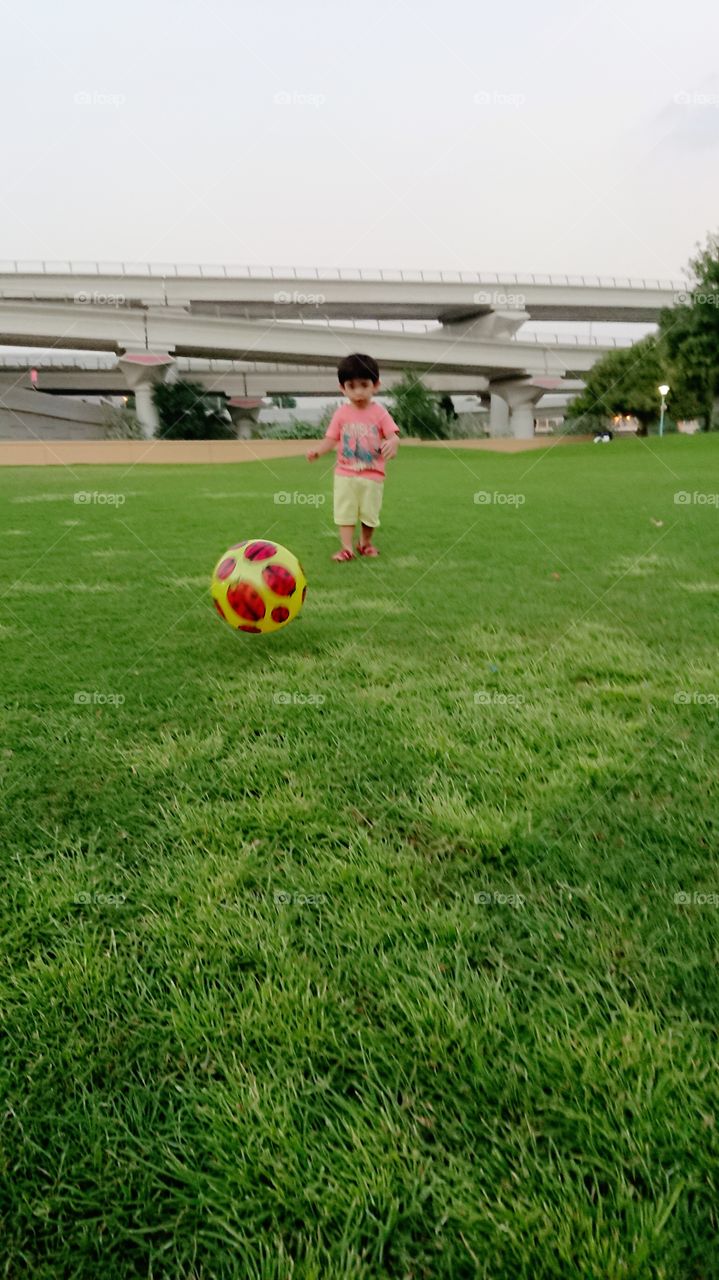 Son playing in the Park