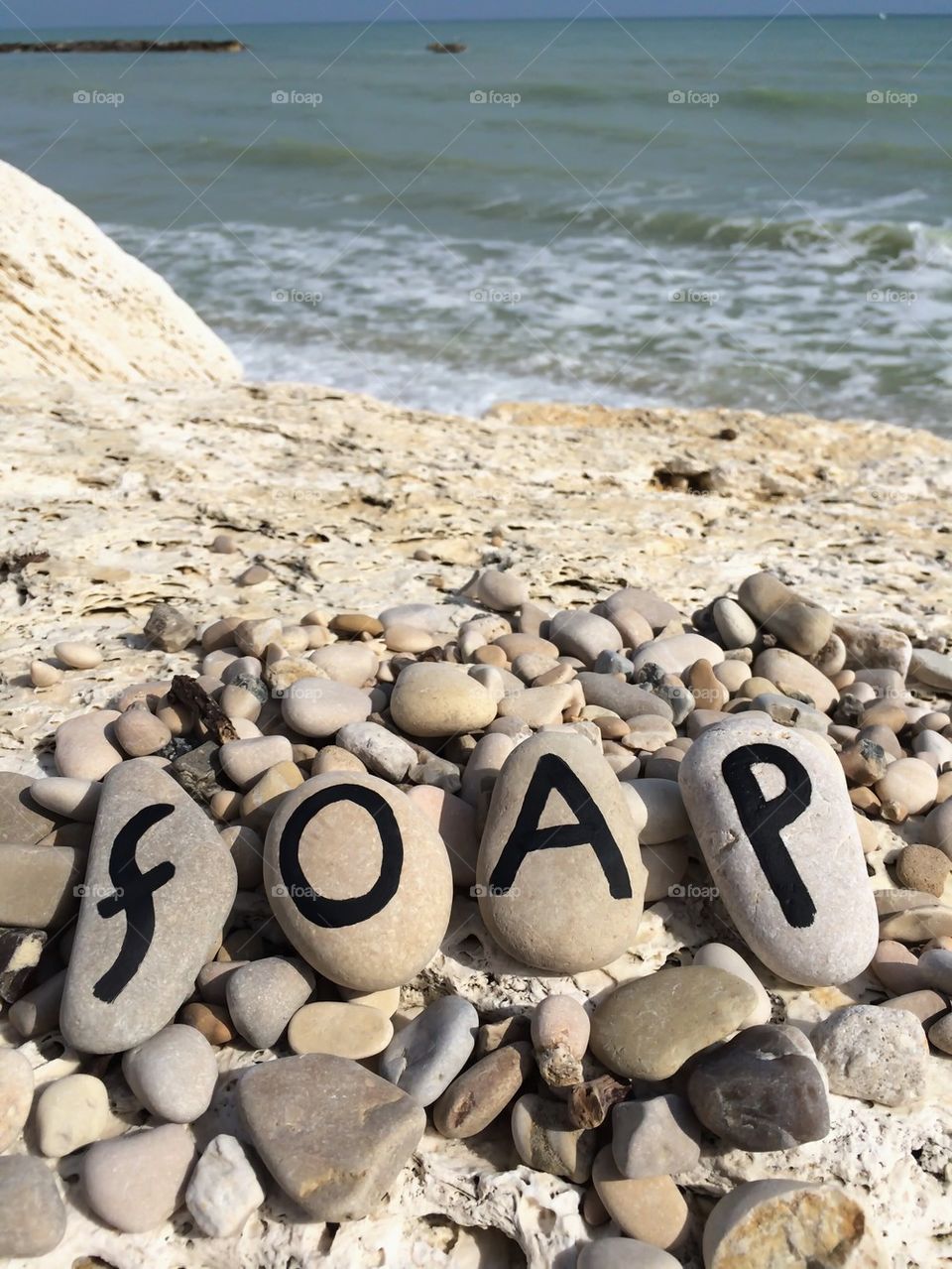 Foap on stones with black letters