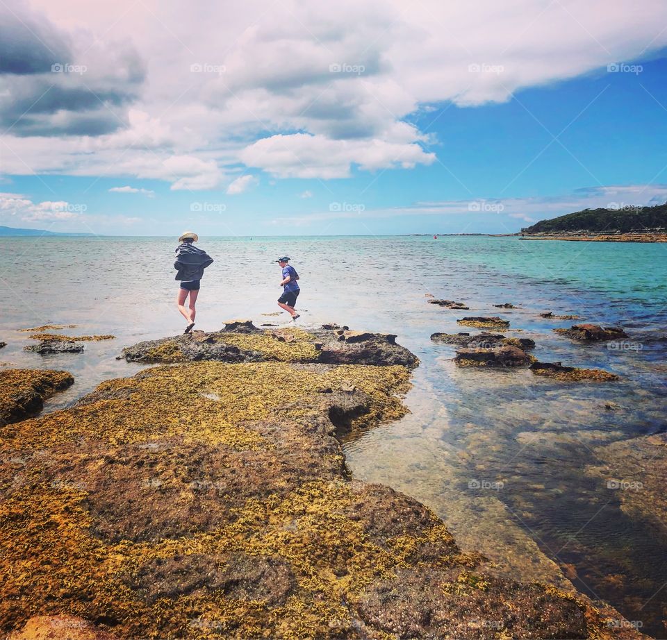 The rock hoppers under cloudy skies 