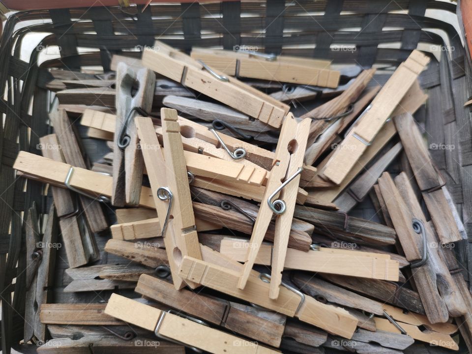 Clothes pins in a basket