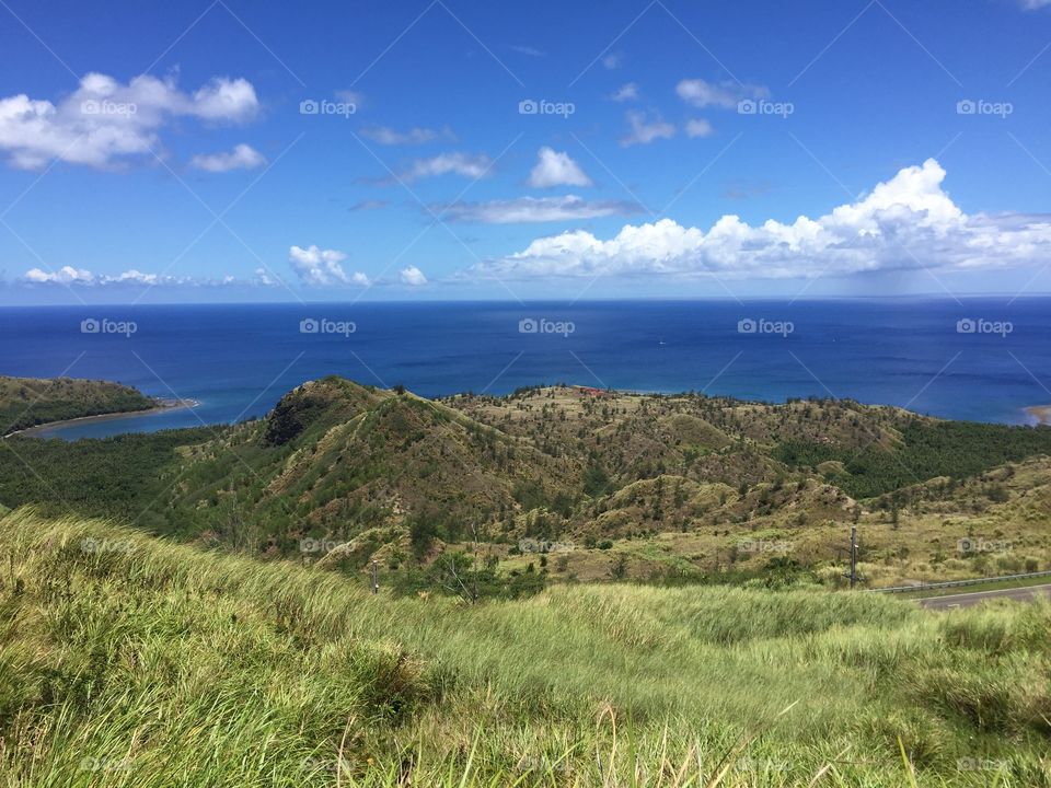 View on the hike up to the top of Mt. Jumollong Manglo, looking out at the cliffs and mountains on Guam.
