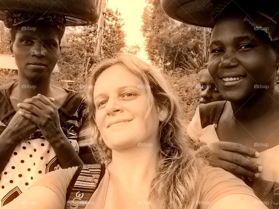 Africa Selfie. Traveling though Africa I took this selfie with women walking on the road.