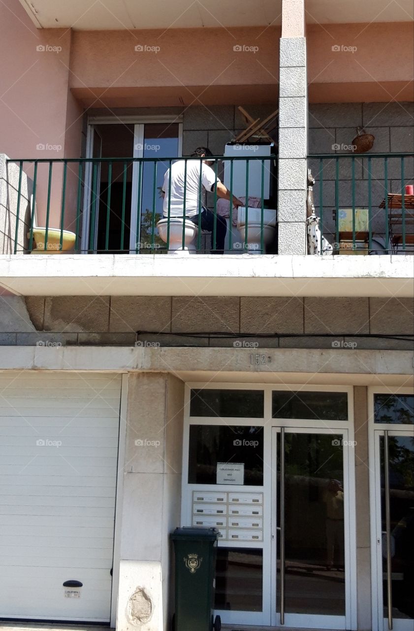 scene on a balcony in Lisbon