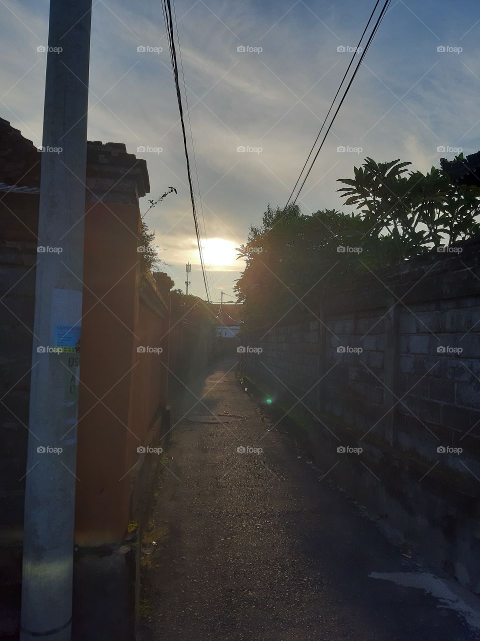 A sunrise seen form the alleyway in the morning