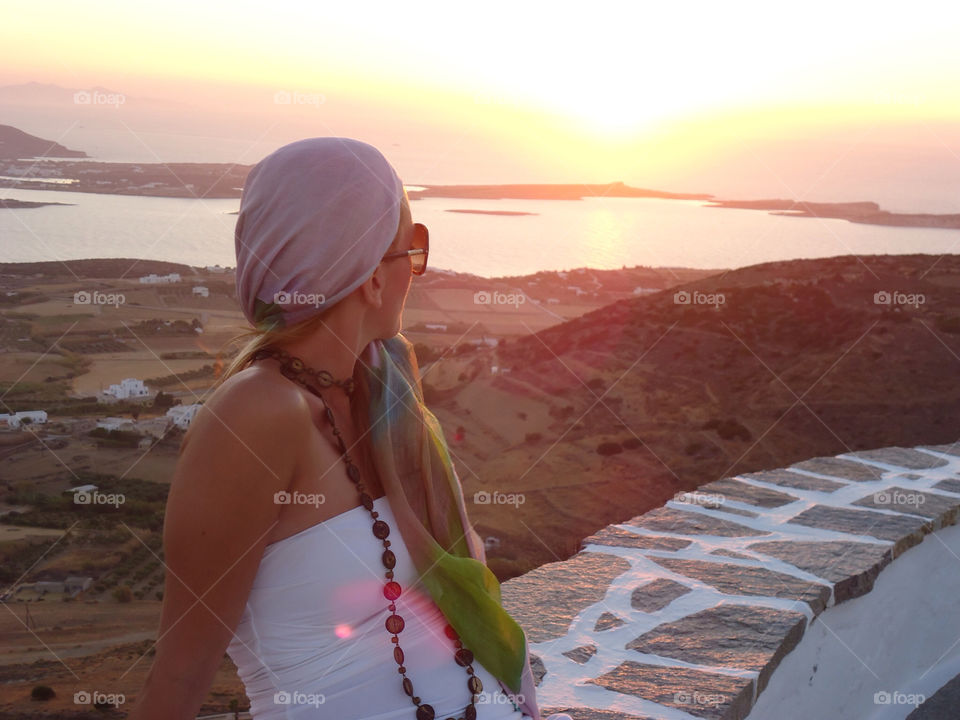 paros greece woman sunset sea by yiotou