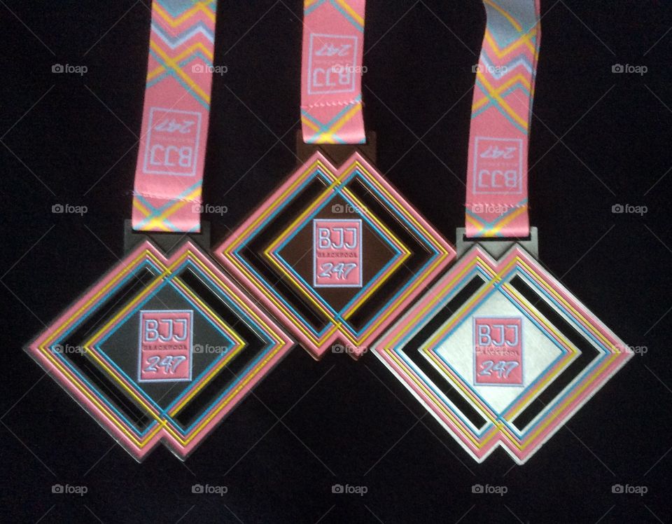 Competition Medals displayed on a black background 