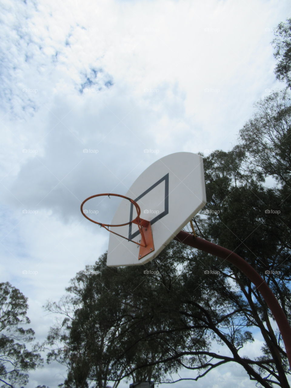 A simple photograph of a basketball hoop