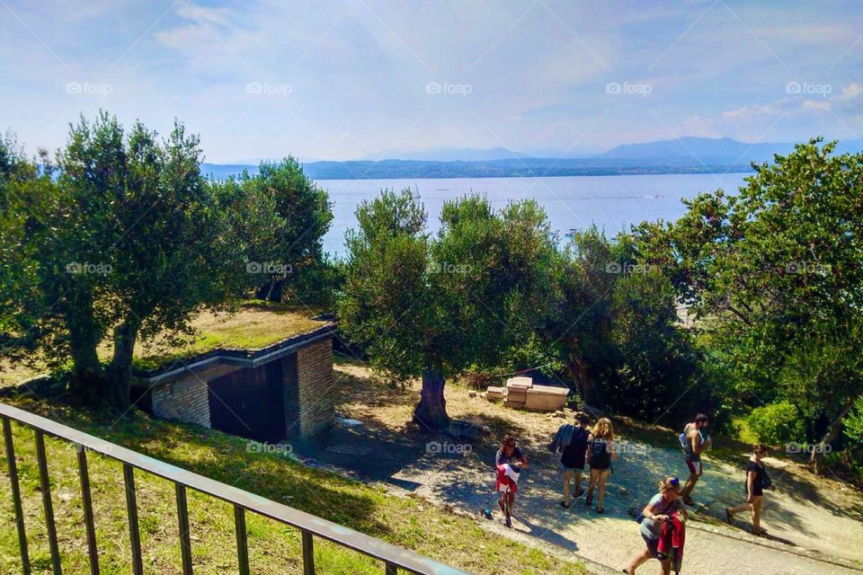 A beautiful and ancient look can be found in the architecture, the vegetation and of course the clear blue water of „Lago Di Garda“, the „Lake Garda“ in northern Italy. The Alps can be seen far away at the horizon. 2023. Hypnotic Productions