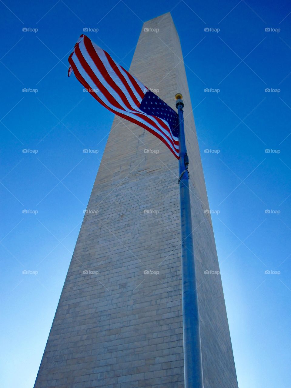 Washington Monument with the American flag

