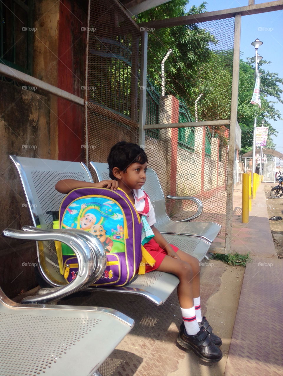 child waiting school van, kid waiting bus, school time, bus stop,