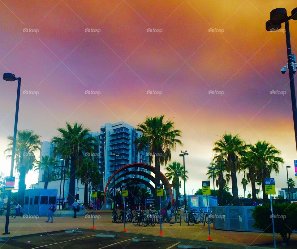 Metro entrance with red sky 