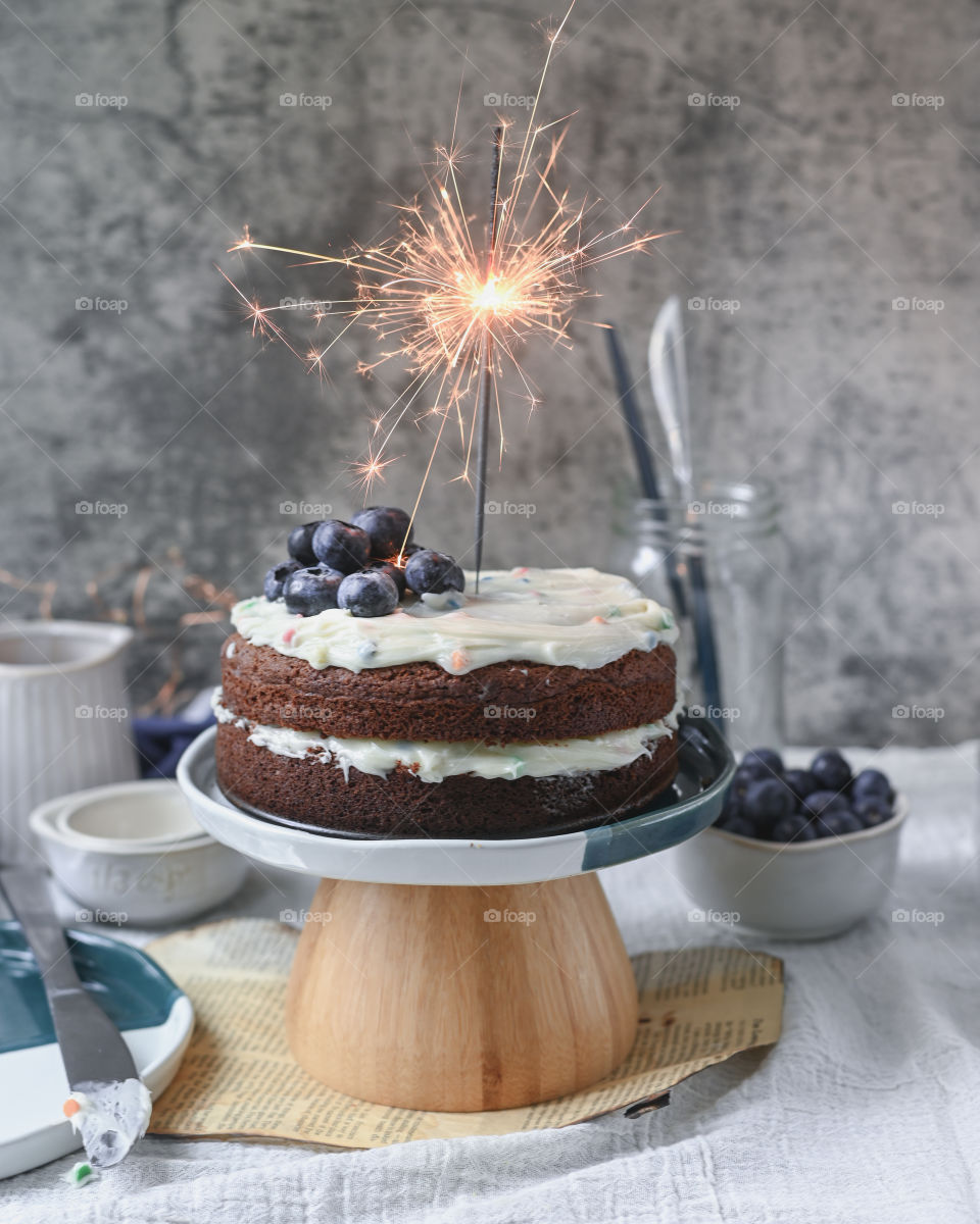 Almond flour cake in the picture, already the festive season has began here sharing sparkler shot on the cake. Festive vibes. 