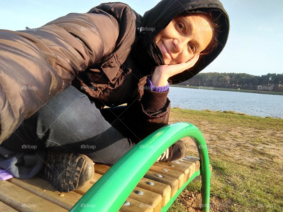 selfie girl on the nature lake shore