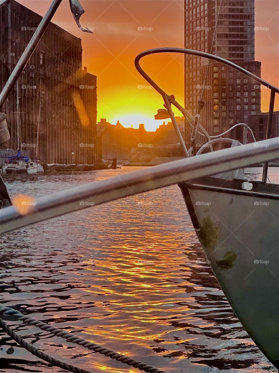 This is “Newtown Creek” by the “Pulaski Bridge” in LIC, Queens at sunset time right before nightfall seen from “Salvation”, the “28 foot 1969 Luhrs” cabin cruiser that I and my partner “Timothy Trespas” call home. 2024. Hypnotic Productions