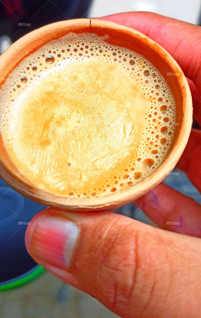 Desi Indian tea with hand