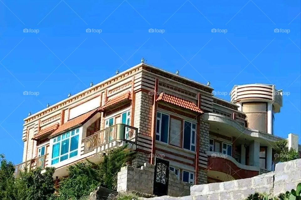 A stunning view of green mountains covered in fog in Yemen