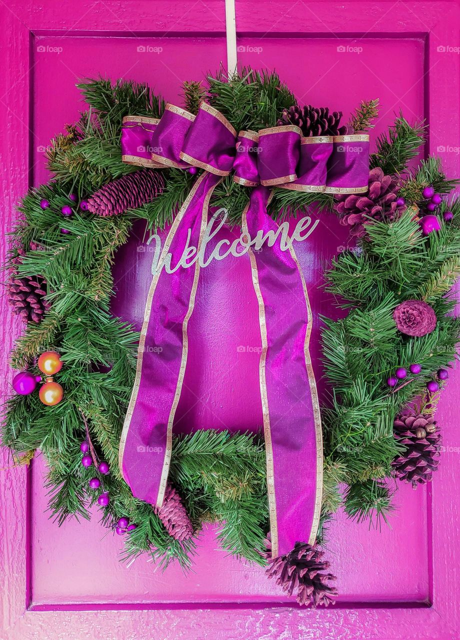 Barbie Style inspired holiday welcome wreath on front door.