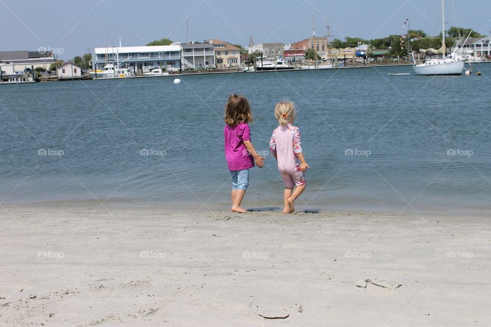 Kids by waterway. Kids on Carrot Island, NC