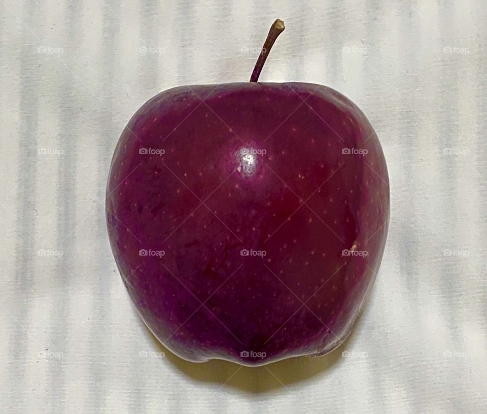 Shadow of an apple, photography of single apple with white background. A perfect photo for single object photography 