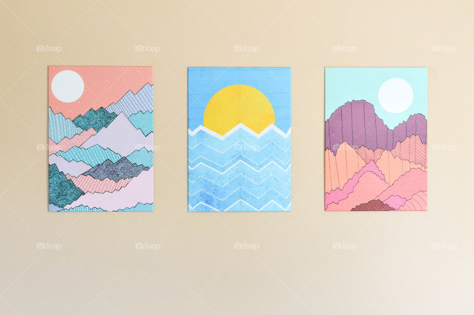 Graphic wall art series displayed on a wall