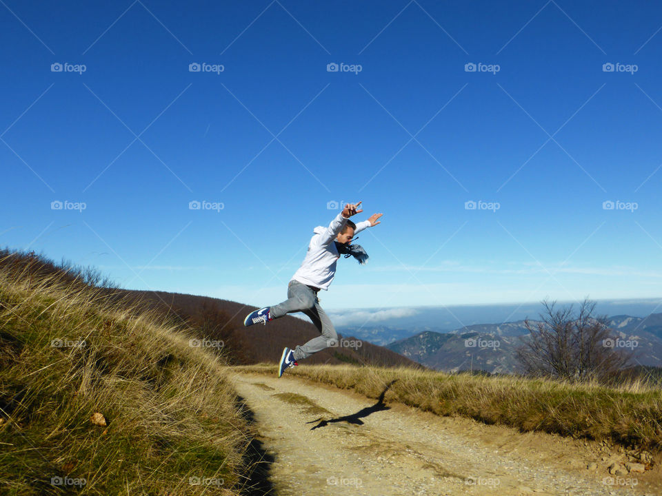 A man is rolling on the road