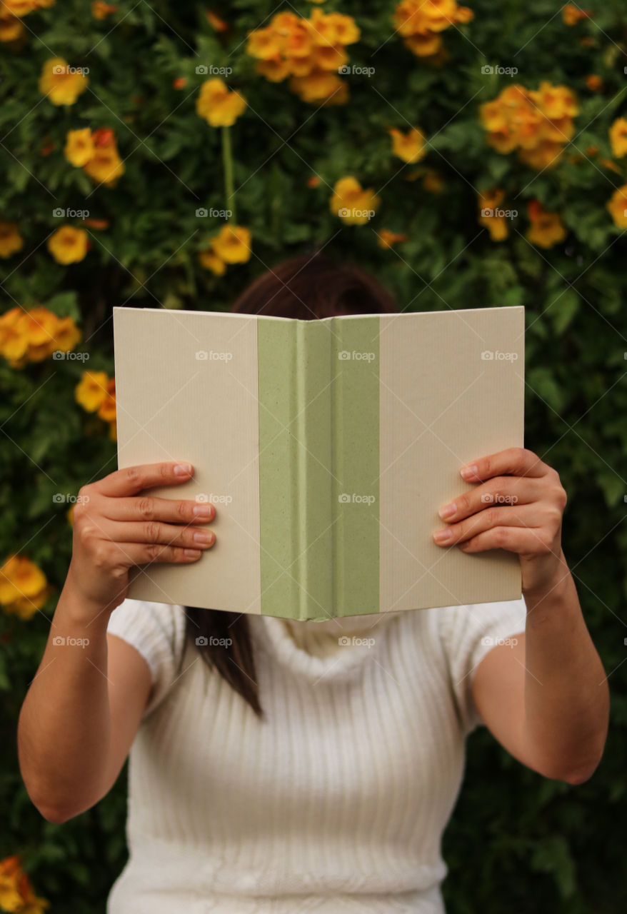 Woman Holding a Book