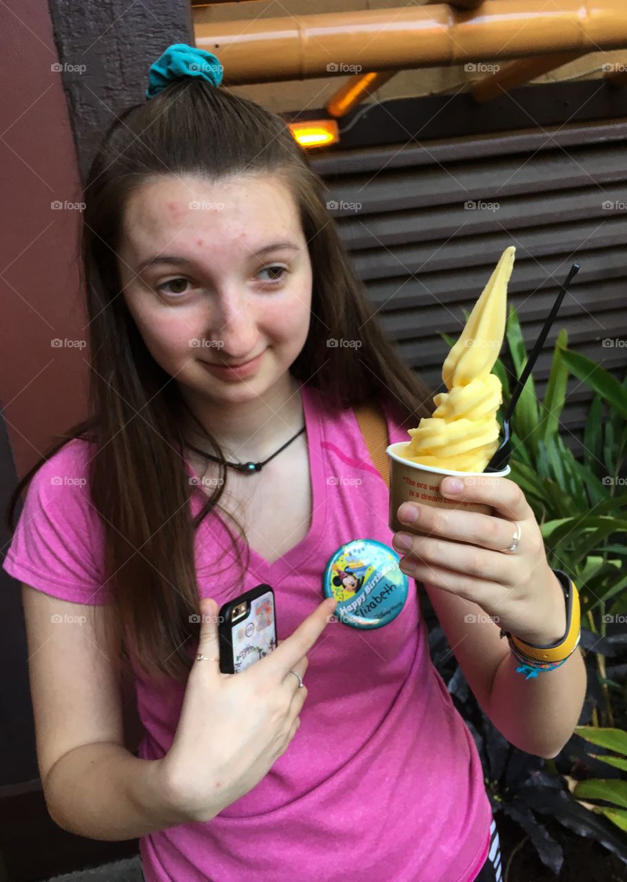 Yum, first Dole Whip!  And it was free for her birthday!  Pineapple soft serve ice cream is delicious. 