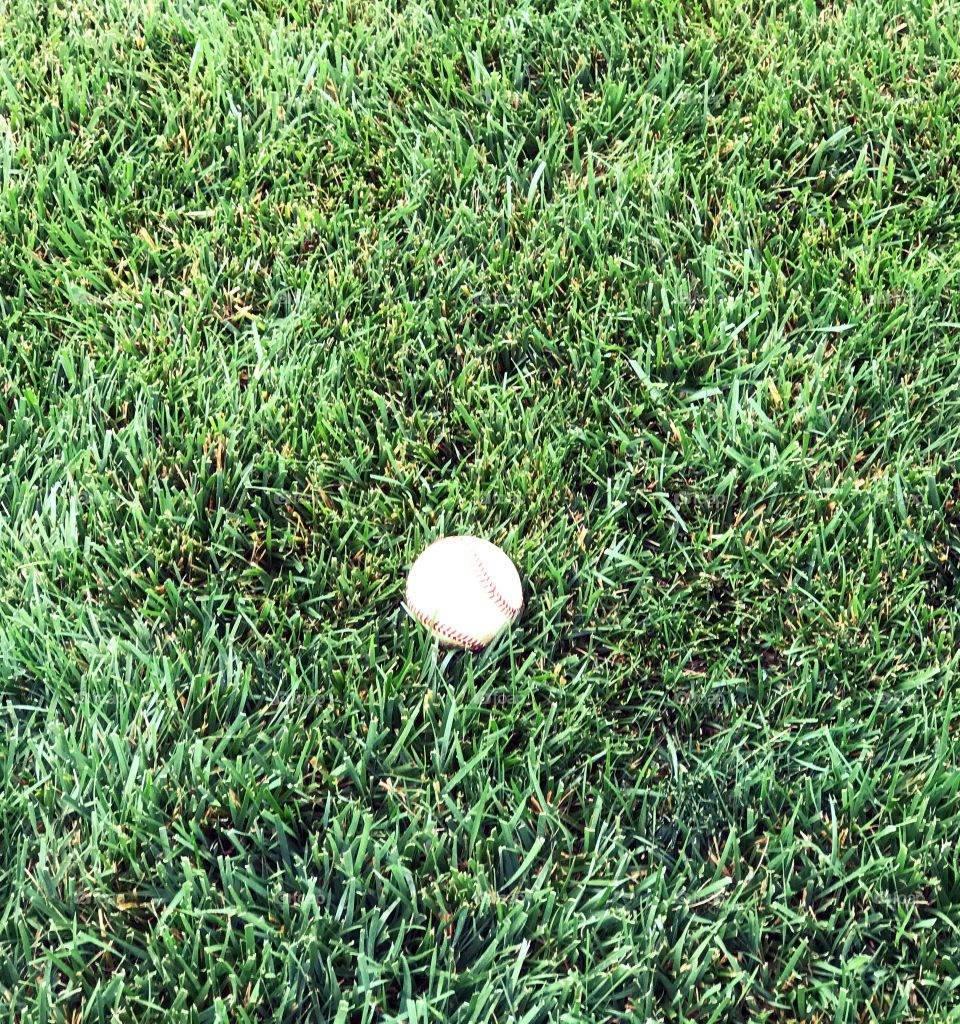 Baseball with grass background.